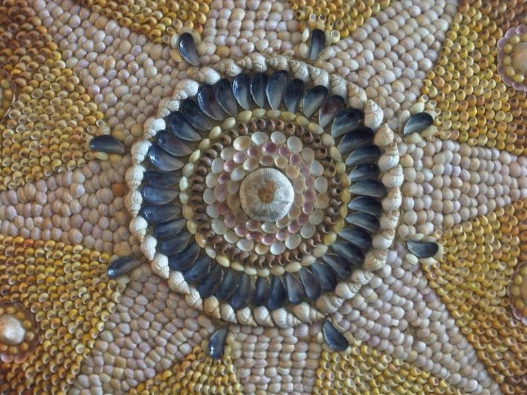 The Shell Grotto (UK) is a subterranean passageway with walls decorated ...